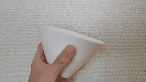 Pressing the soft silicone of a U.F.O. TW cup
